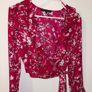 Womens top, size small. Pink with white/navy floral.